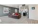 Inviting living room with access to the kitchen, featuring stylish furnishings and neutral tones at 9520 N Central Ave, Phoenix, AZ 85020