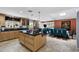 Open kitchen with large island flowing into the dining area, perfect for entertaining at 961 Leisure World --, Mesa, AZ 85206