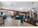 Open-concept living and dining area with tile floors, neutral walls, and a seamless flow at 961 Leisure World --, Mesa, AZ 85206