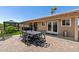 Outdoor patio featuring a dining table and chairs, perfect for backyard gatherings at 961 Leisure World --, Mesa, AZ 85206