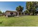 Expansive backyard featuring a lush lawn and charming patio, perfect for outdoor living and entertaining at 1010 E Buena Vista Dr, Tempe, AZ 85284