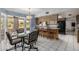 Kitchen boasts a dining table and an island with barstool seating at 1010 E Buena Vista Dr, Tempe, AZ 85284