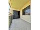 Cozy balcony providing a relaxing retreat with tiled flooring and a serene neighborhood view at 10330 W Thunderbird Blvd # C206, Sun City, AZ 85351