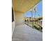 Balcony view with black iron railing overlooking landscaped grounds, enhancing outdoor living space at 10330 W Thunderbird Blvd # C206, Sun City, AZ 85351