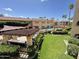 Beautiful courtyard features an outdoor kitchen area and landscaping, including a pool at 10330 W Thunderbird Blvd # C206, Sun City, AZ 85351