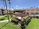 Beautiful courtyard features an outdoor kitchen area and landscaping at 10330 W Thunderbird Blvd # C206, Sun City, AZ 85351