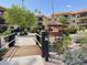 Picturesque courtyard with pond, bridge, gazebo and lush landscaping at 10330 W Thunderbird Blvd # C206, Sun City, AZ 85351