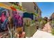 Serene courtyard showcasing vibrant art and lush greenery at 10449 E Jacob Ave, Mesa, AZ 85209