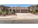 Charming single-story home with desert landscaping, a tile roof, and a spacious two-car garage at 10449 E Jacob Ave, Mesa, AZ 85209