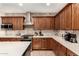 Well-equipped kitchen with stainless steel appliances, stylish tile backsplash, and plenty of counter space at 10449 E Jacob Ave, Mesa, AZ 85209