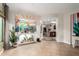 Bright living room featuring tile floors, neutral walls, and curated decor elements at 10449 E Jacob Ave, Mesa, AZ 85209