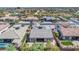 An aerial view of the houses and the neighborhood, featuring desert landscaping and tiled roofs at 10664 E Ellis St, Mesa, AZ 85207