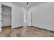 Spacious bedroom featuring tiled floors, ceiling fan, and a walk-in closet at 10664 E Ellis St, Mesa, AZ 85207
