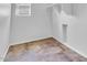 Bright closet with neutral walls, a window, and shelving at 10664 E Ellis St, Mesa, AZ 85207