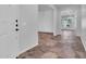Inviting foyer with tile flooring, leading to open living spaces and ample natural light at 10664 E Ellis St, Mesa, AZ 85207