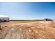 Showing newly built home and large lot with metal outbuilding at 11564 E Windsor Way, Florence, AZ 85132