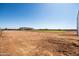 Backyard showing plenty of dirt area with grass around new home construction at 11564 E Windsor Way, Florence, AZ 85132