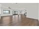 Open-concept living area with expansive windows, recessed lighting, and modern tile flooring at 11564 E Windsor Way, Florence, AZ 85132