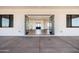 Expansive patio features seamless indoor-outdoor living through folding glass doors at 11564 E Windsor Way, Florence, AZ 85132