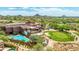 Stunning aerial view of the Ancala Country Club's clubhouse, pool, and golf course at 11773 E Desert Trail Rd, Scottsdale, AZ 85259