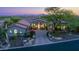 Beautiful home featuring mature landscaping and a paved driveway, creating a welcoming entrance at 11773 E Desert Trail Rd, Scottsdale, AZ 85259