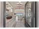 Stunning home's open-concept living area showcases expansive views and a seamless indoor-outdoor connection at 11773 E Desert Trail Rd, Scottsdale, AZ 85259