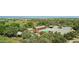 Aerial view of the community pool with seating areas and lush landscaping at 14844 W Pershing St, Surprise, AZ 85379