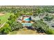 Aerial view of the community pool with seating areas and lush landscaping at 14844 W Pershing St, Surprise, AZ 85379