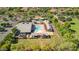 Aerial view of the community pool with seating areas and lush landscaping at 14844 W Pershing St, Surprise, AZ 85379