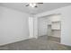 Empty bedroom closet with mirrored doors and organized shelving and hanging space at 14844 W Pershing St, Surprise, AZ 85379