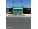 Charming turquoise mobile home with carport and small landscaped yard at 150 S Windsor Dr # 35, Mesa, AZ 85204