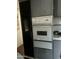 Kitchen featuring stainless steel appliances and gray cabinets at 150 S Windsor Dr # 35, Mesa, AZ 85204