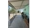 Covered patio with seating and a view of the mobile home community at 150 S Windsor Dr # 35, Mesa, AZ 85204