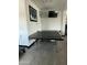 Recreation area featuring a ping pong table and wall-mounted television at 150 S Windsor Dr # 35, Mesa, AZ 85204