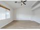 Bright bedroom with a ceiling fan and large windows at 1584 E Harrison E St, Chandler, AZ 85225