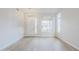 Bright entryway with wood-look flooring, a pendant light, and large window at 1584 E Harrison E St, Chandler, AZ 85225