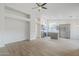 Open-concept living room and kitchen with recessed lighting and wood-look floors at 1584 E Harrison E St, Chandler, AZ 85225