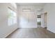 Bright living room featuring a pendant light fixture and neutral walls at 1584 E Harrison E St, Chandler, AZ 85225