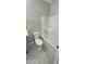 Clean bathroom features a white shower-tub combo, toilet, and neutral wall color at 17423 W Country Club Ter, Surprise, AZ 85387