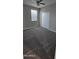 Cozy bedroom featuring plush carpeting, neutral walls, a window, and a closet with sliding doors at 17423 W Country Club Ter, Surprise, AZ 85387
