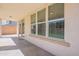 Covered back patio offering a shady spot with views of the backyard at 18123 W Lundberg St, Surprise, AZ 85388