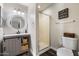 Updated bathroom with modern vanity, shower, and stylish decor at 19002 N 25Th Pl, Phoenix, AZ 85050