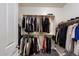 Well-organized closet with ample hanging space for clothing and storage at 19002 N 25Th Pl, Phoenix, AZ 85050