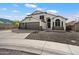 Beautiful two-story home with a three-car garage and well-maintained front yard at 19002 N 25Th Pl, Phoenix, AZ 85050