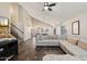 Open-concept living room featuring a staircase and hardwood flooring with view into the kitchen at 19002 N 25Th Pl, Phoenix, AZ 85050
