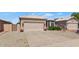 Traditional home with a spacious 2 car garage and desert landscaping at 19860 N 110Th Ln, Peoria, AZ 85373