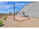 Beautiful backyard featuring a bocce ball court in a well maintained, inviting outdoor space at 20151 E Via Del Palo St, Queen Creek, AZ 85142