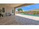 Relaxing backyard pool area with covered patio and lounge chairs for outdoor enjoyment at 20151 E Via Del Palo St, Queen Creek, AZ 85142