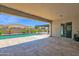 Inviting backyard pool area with lush landscaping, perfect for summer fun and relaxation at 20151 E Via Del Palo St, Queen Creek, AZ 85142