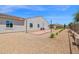 Spacious backyard featuring a bocce ball court, decorative lighting and desert landscaping at 20151 E Via Del Palo St, Queen Creek, AZ 85142